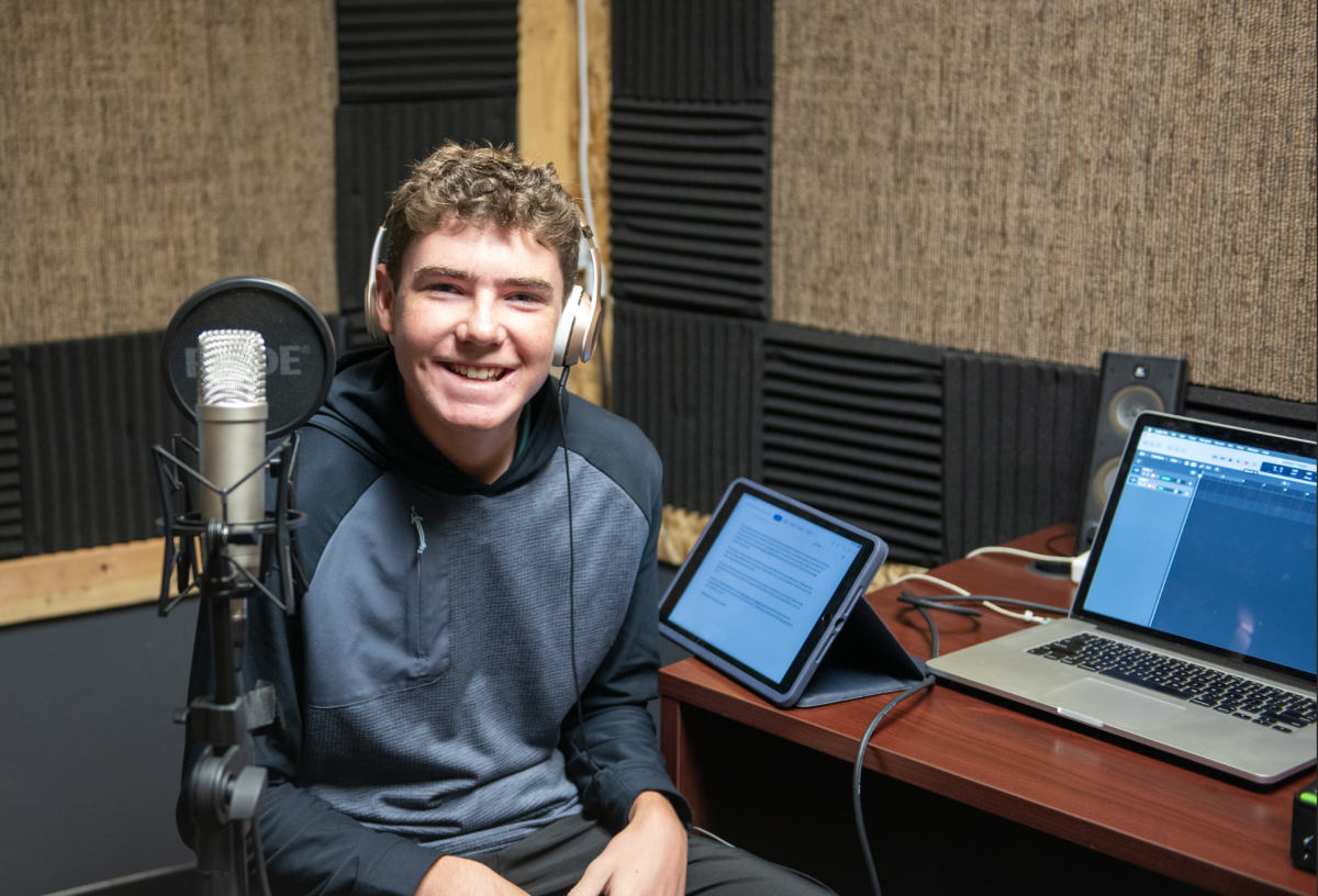 10.29.24 Sophomore Matteo Harris setting up equipment before recording the first episode of the BC Podcast. 